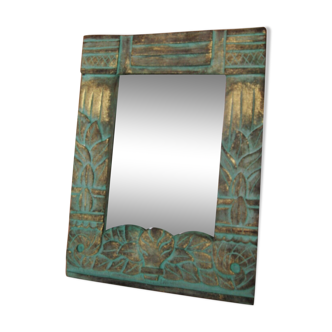 Petit miroir en bois sculpté à patine verte et dorée