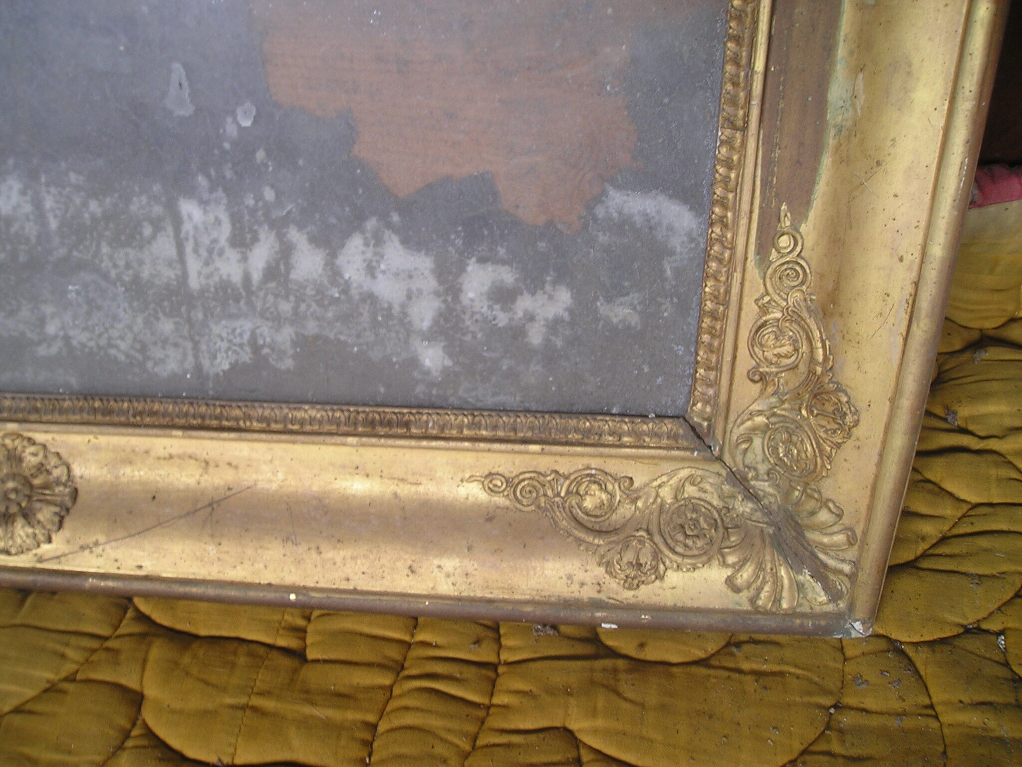 Antique wooden mirror and gilded stucco with gold leaf 89 x 72
