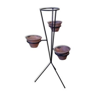 Wrought iron tripod plant holder with terracotta pots