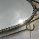 Mid-century modern iron mirror, brutalist, vintage organic, thick sixties.