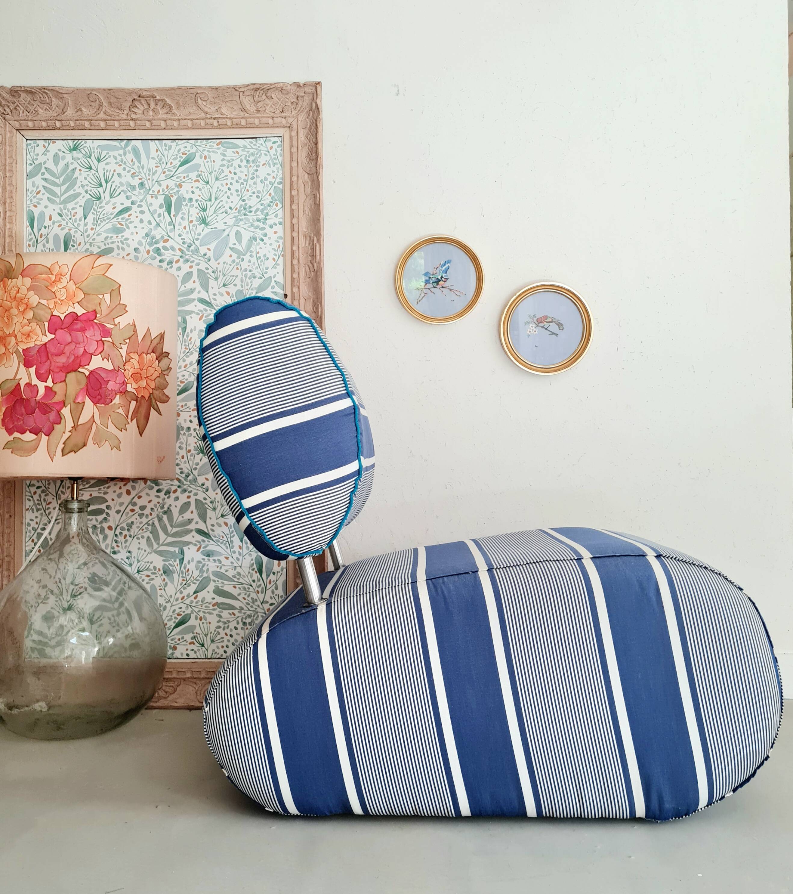 Curved armchair with blue and white stripes