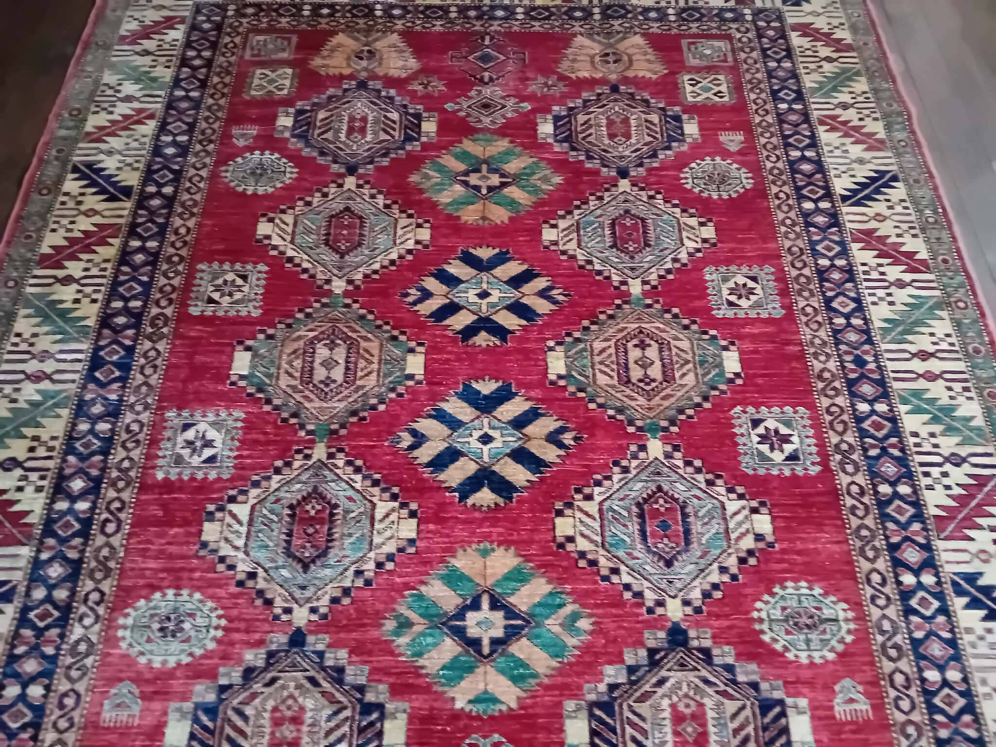 Handmade Pakistani Kazak rug 284x224cm