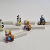 Six Le Merzer porcelain knife holders, 6 cm