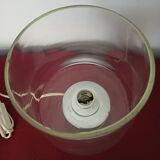 Table lamp, chrome glass stand and transparent glass globe.