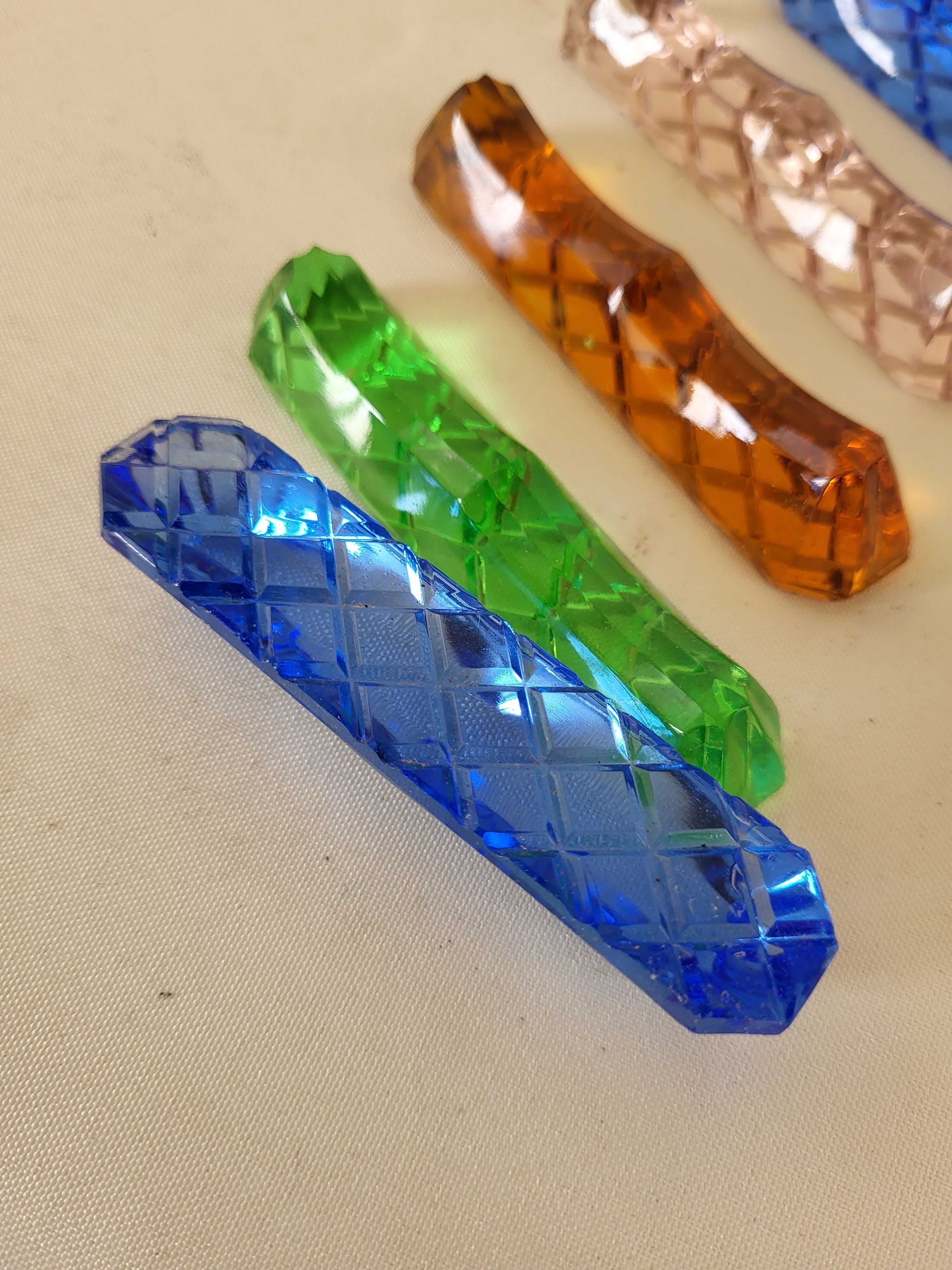 6 glass knife holders of colors