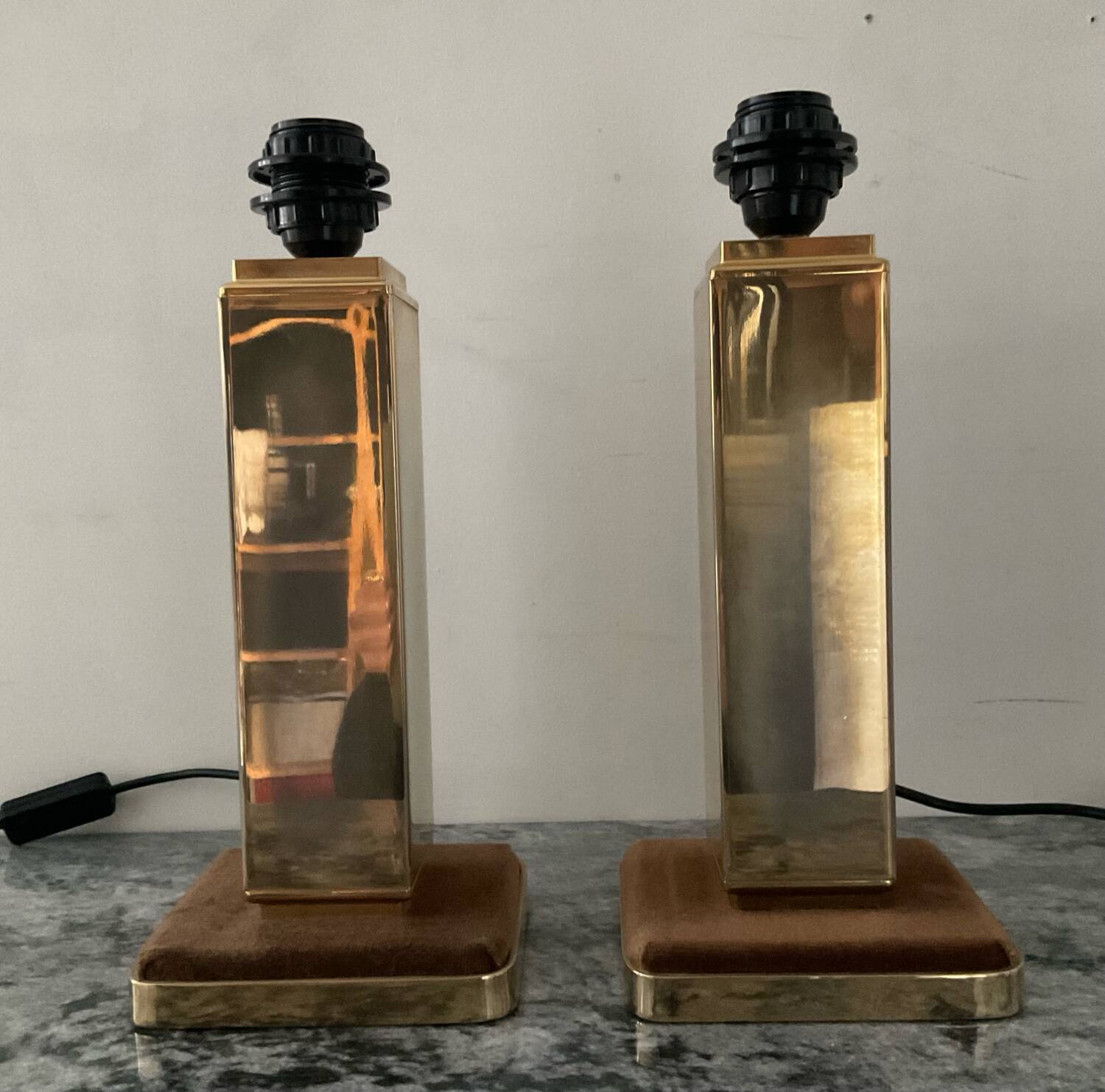 Pair of Hollywood Regency brass table lamps from the 1970s.