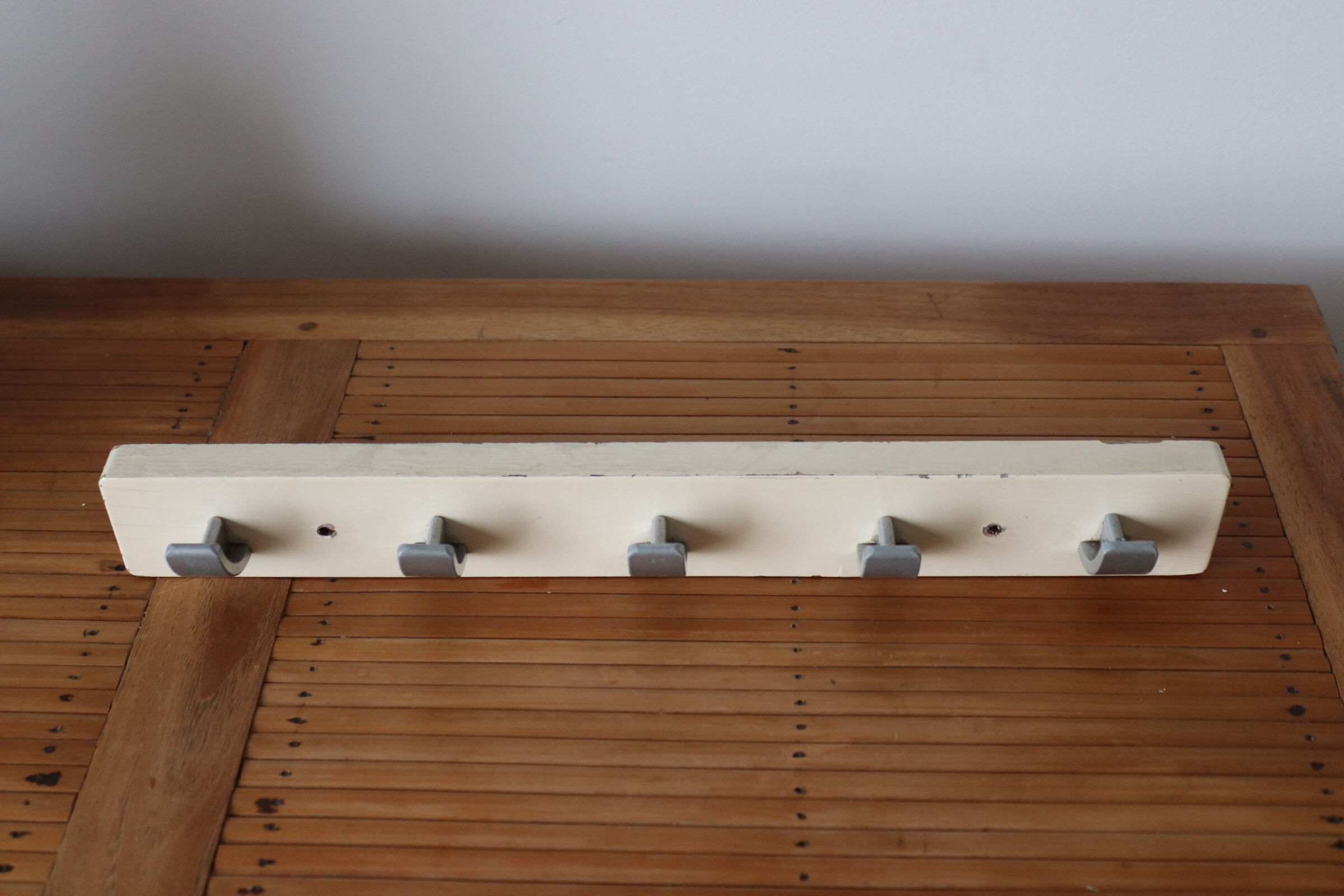 Patinated wood and metal hook