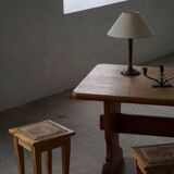 A pair of antique Danish pine stools from the late 19th century.