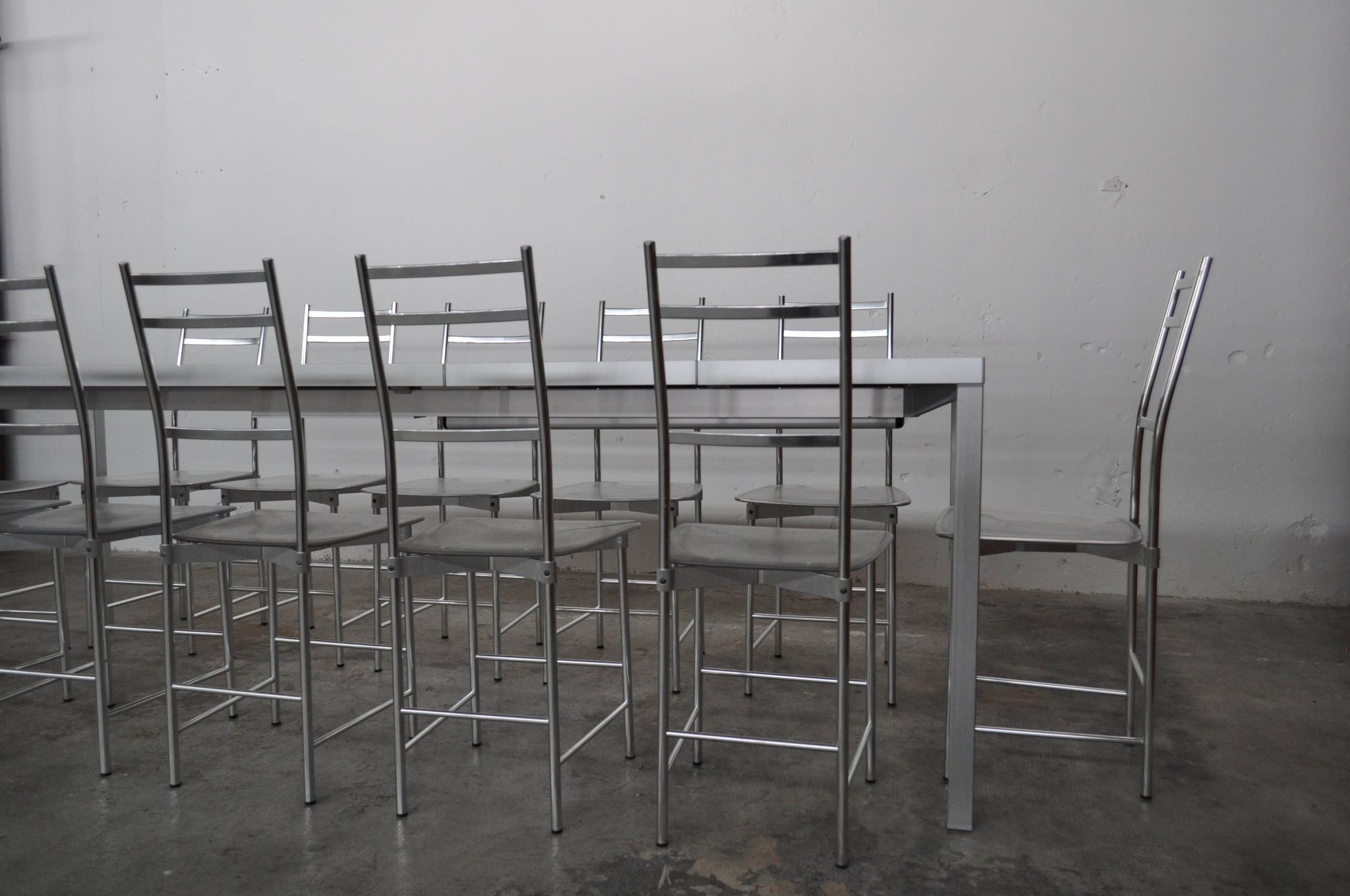 Bagutta Table and Aluminum Chairs by Opera Design for Ycami, 1980s, Set of 13