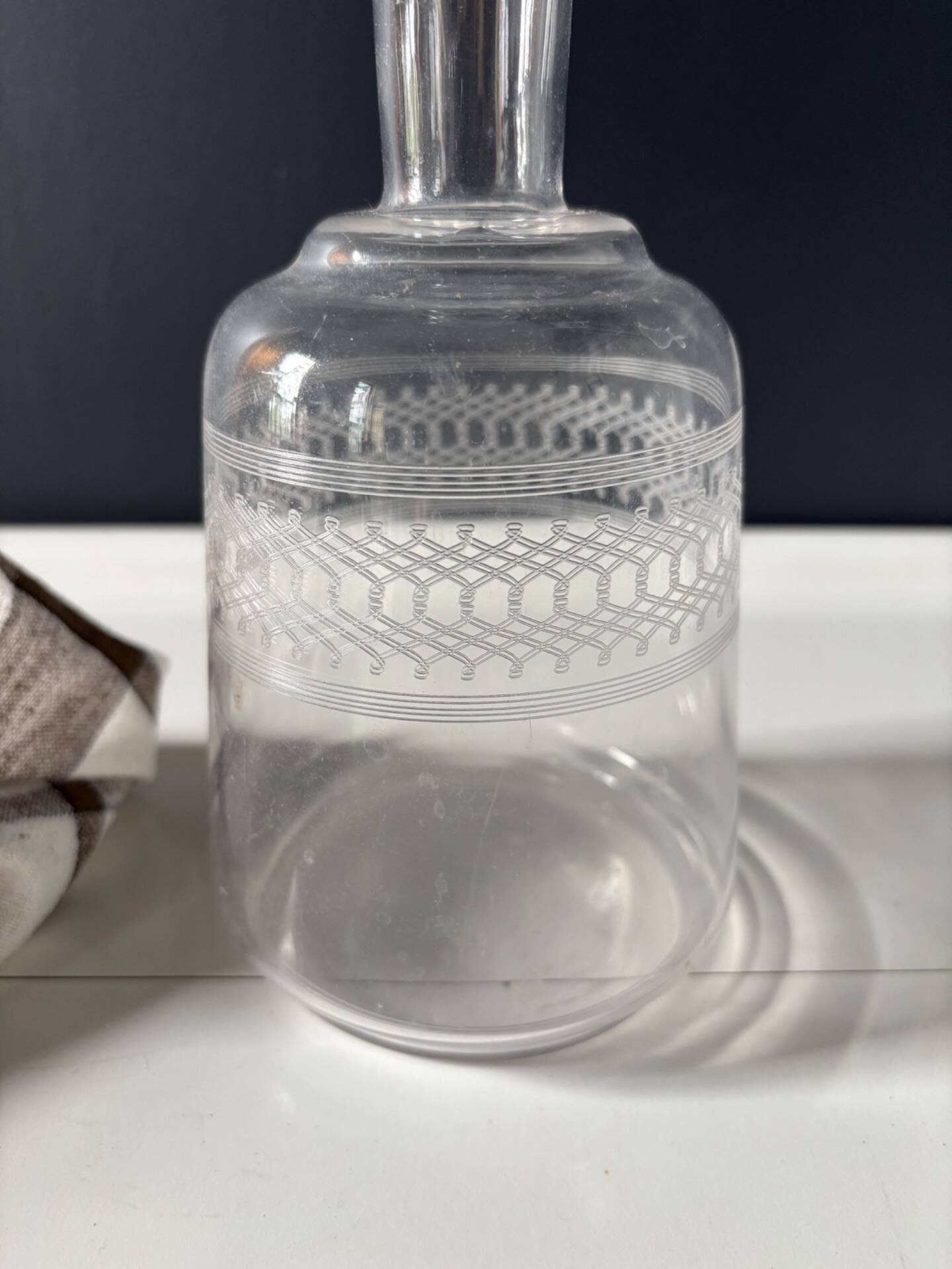 Antique engraved glass carafe with its stopper