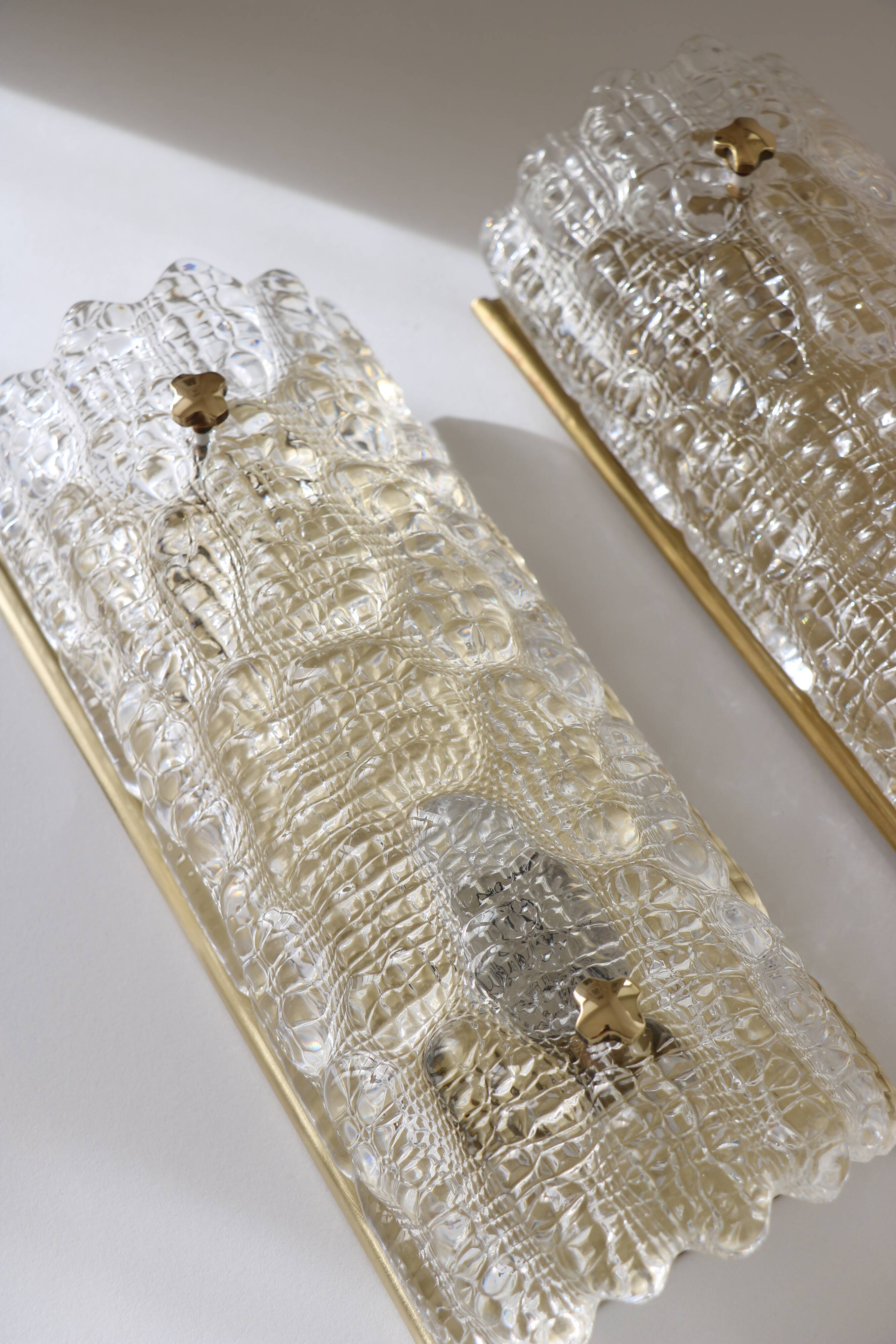 Pair of glass and brass wall lights by Carl Fagerlund for Orrefors, 1960.