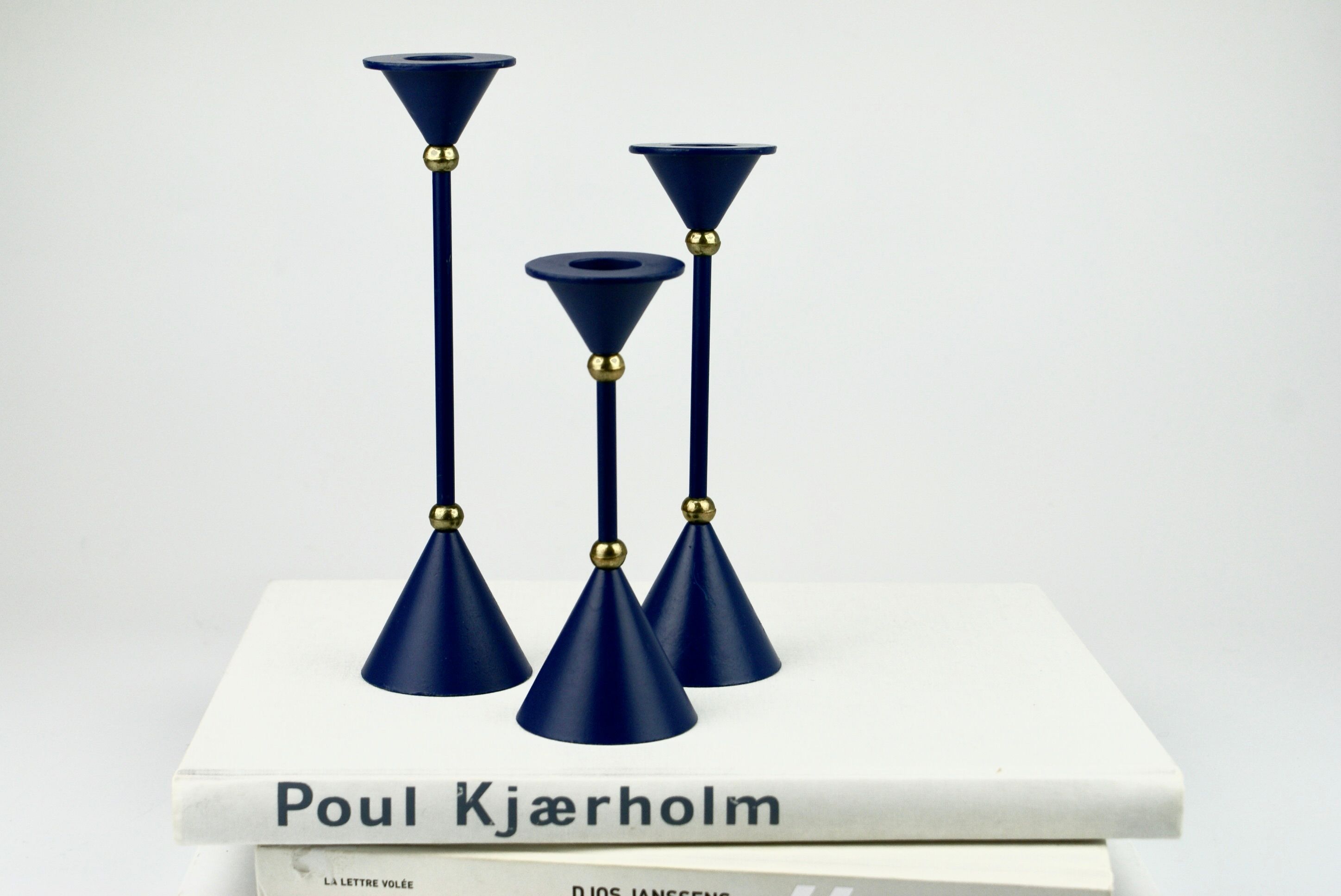 Ensemble de trois bougeoirs bleu foncé