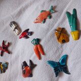 Set of 10 ceramics animals, fish, butterfly