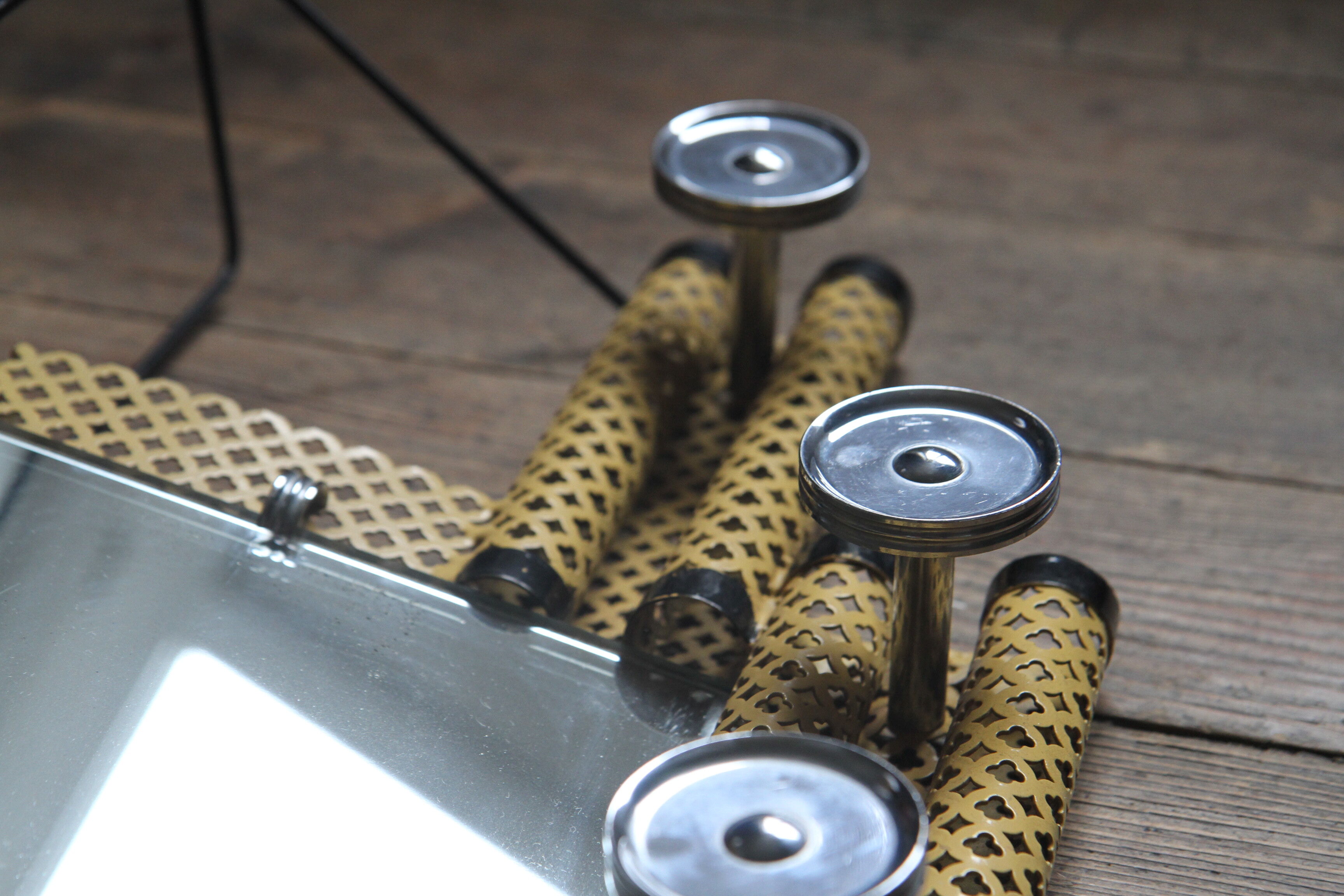 1950s perforated metal coat holder