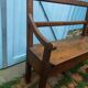 Ancient chestnut bench with armrests, late 19th century