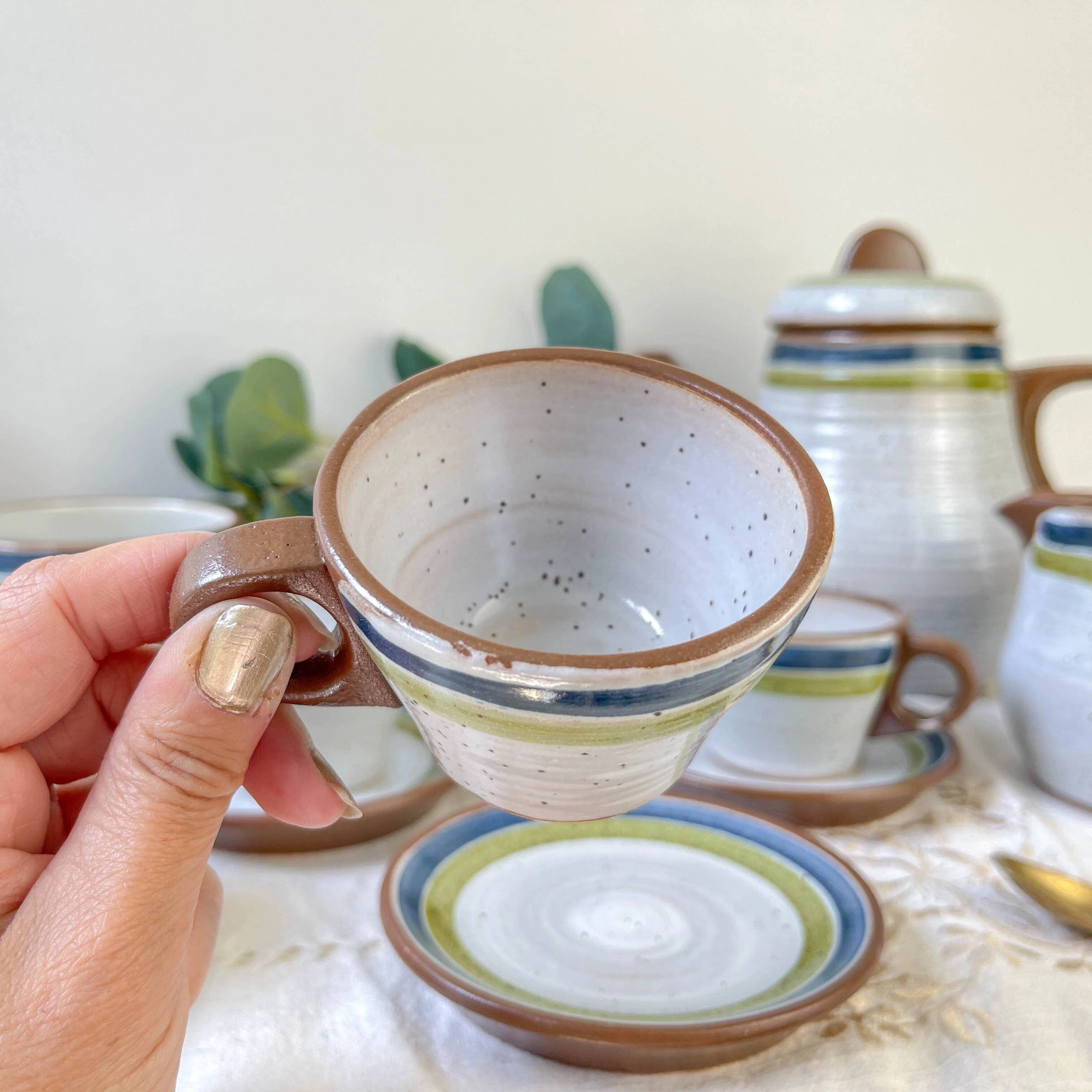 Vintage 1950s speckled stoneware coffee set with grey, green, and blue stripes