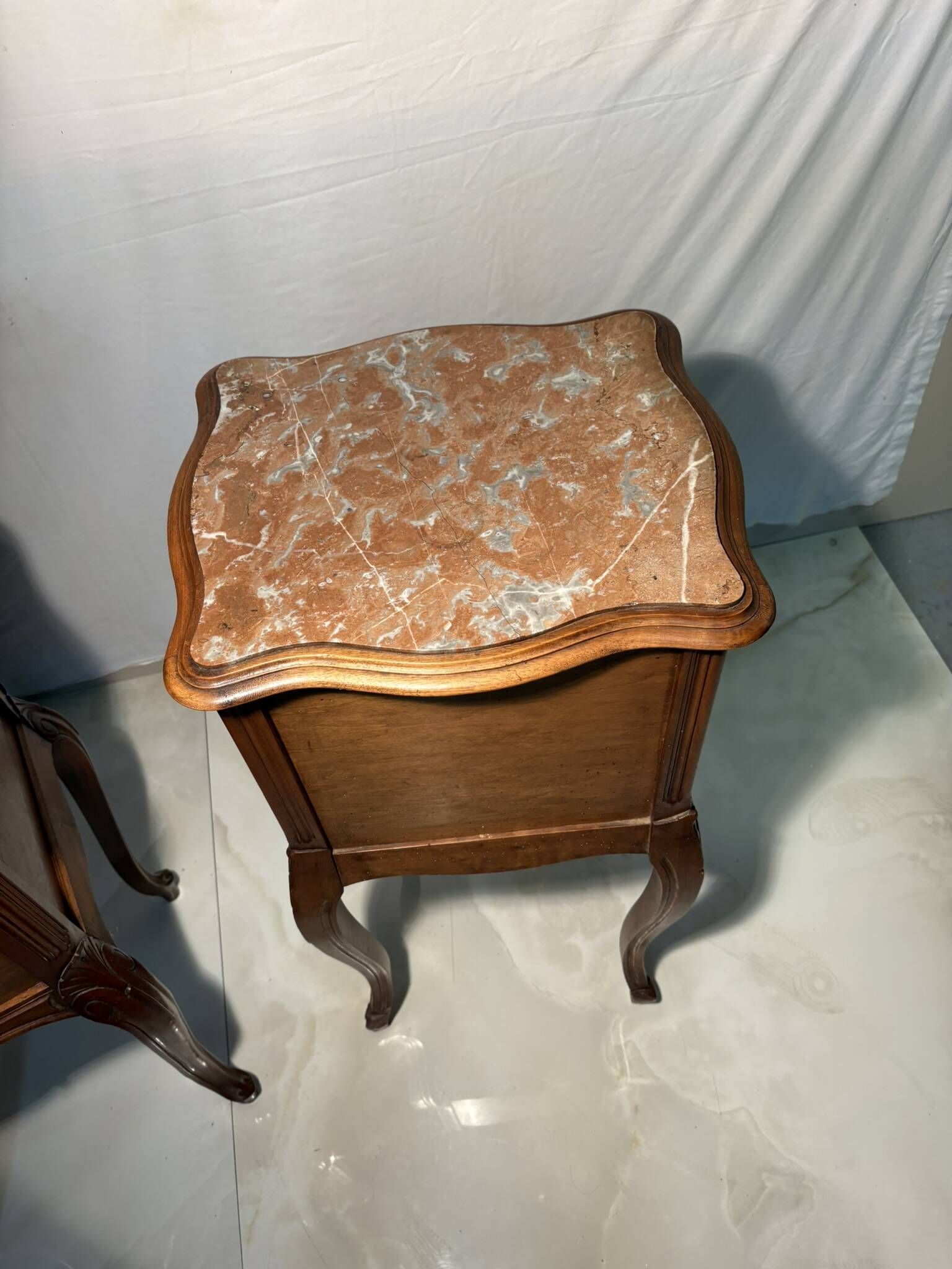 Pair of antique bedside tables with marble top and ceramic niche