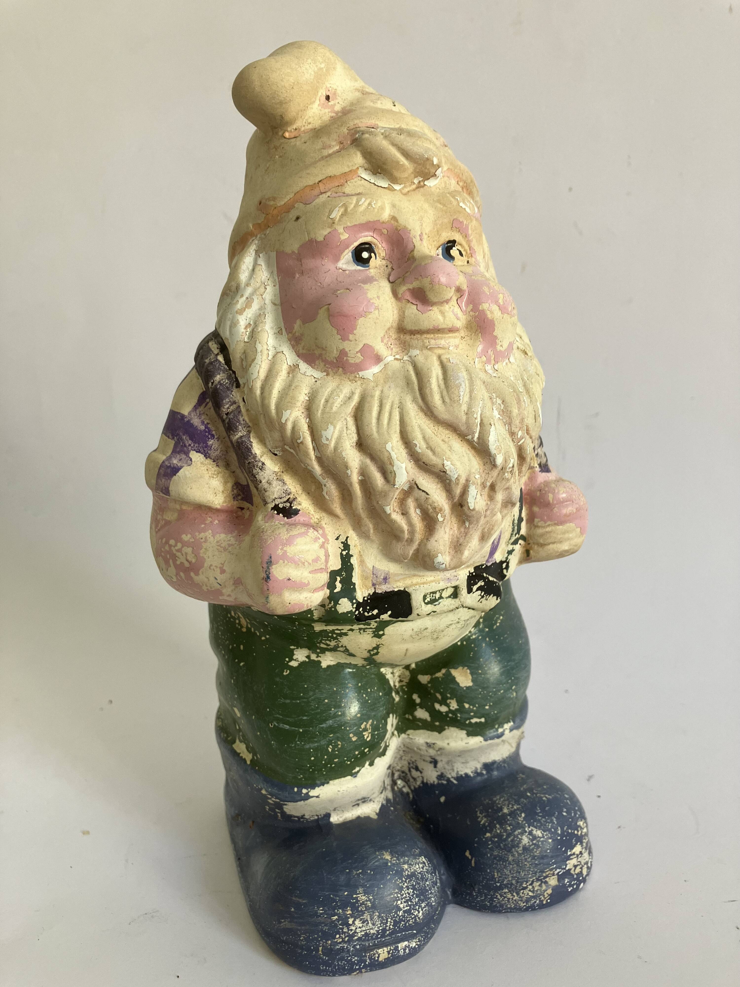 Plaster garden gnome