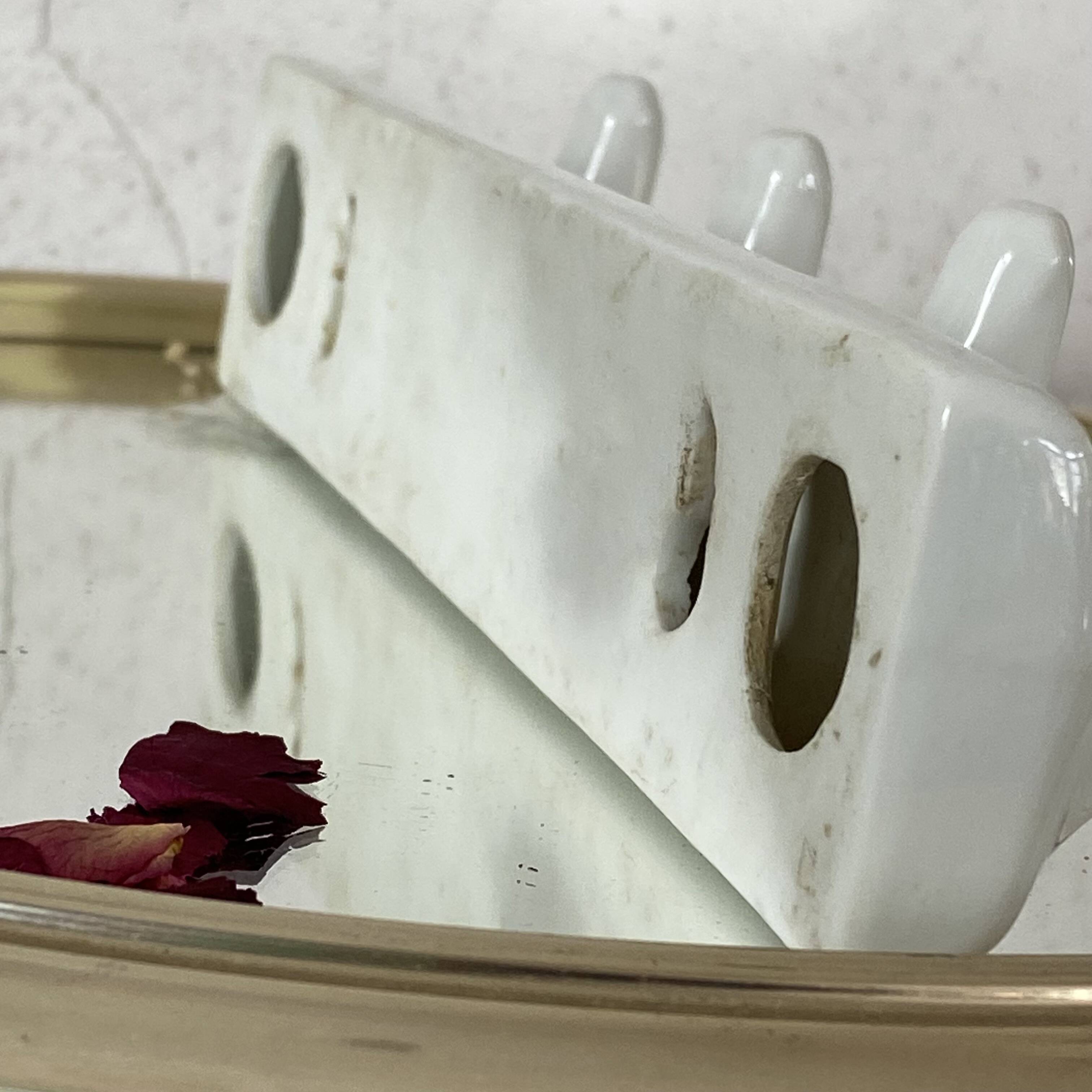 Vintage ceramic tea towel holder