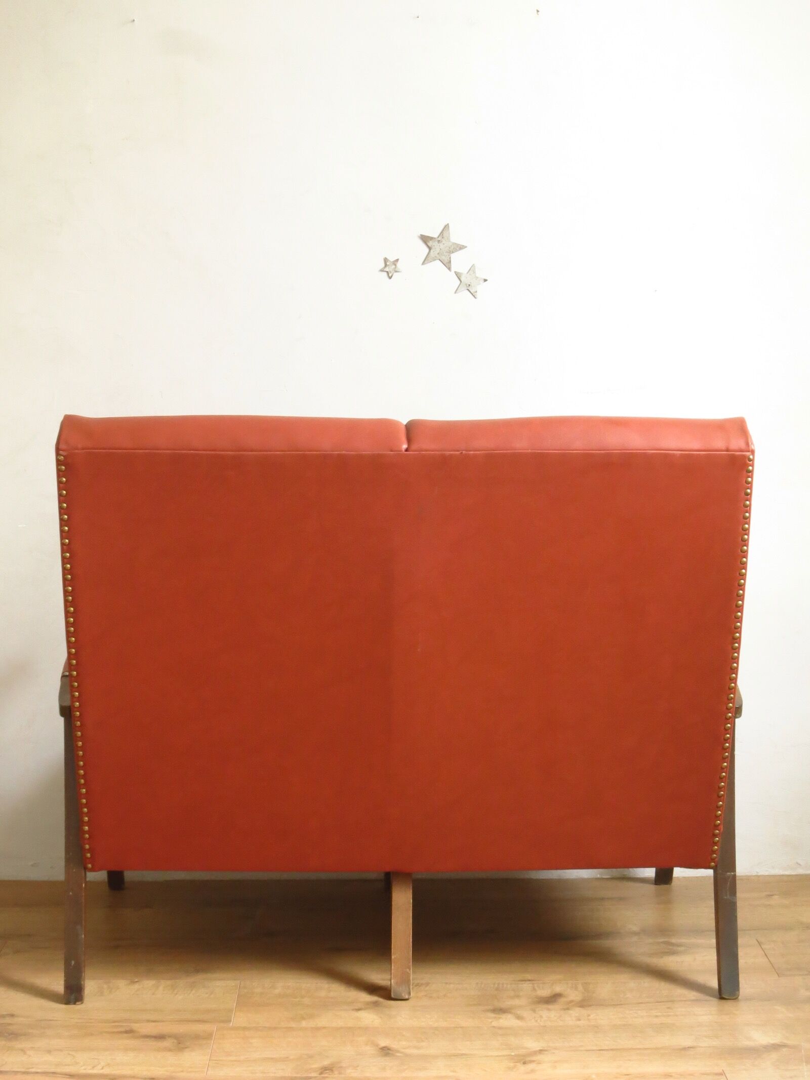 Compass legs armchair