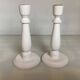 Pair of painted wooden candlesticks