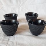 4 black cast iron teacups