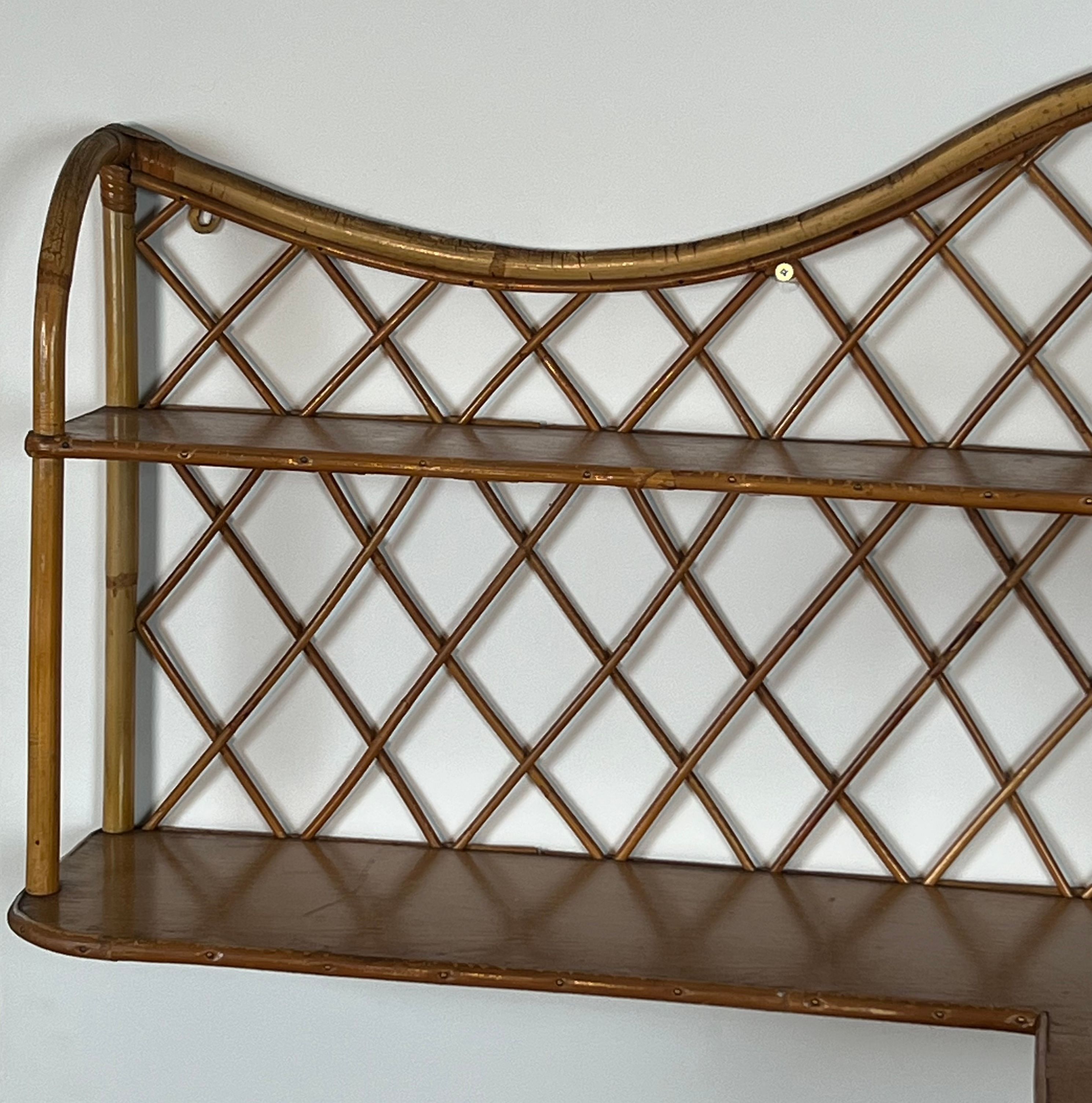 Corner wall shelf in rattan attributed to Audoux-Minet.
