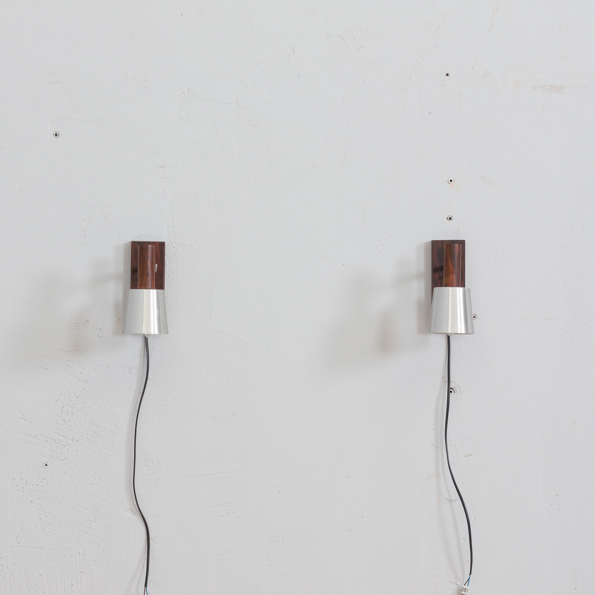 Pair of Jo Hammerborg  rosewood wall sconces with aluminium shades, Denmark 1960s