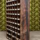 Antique workshop furniture in solid fir with numerous compartments.