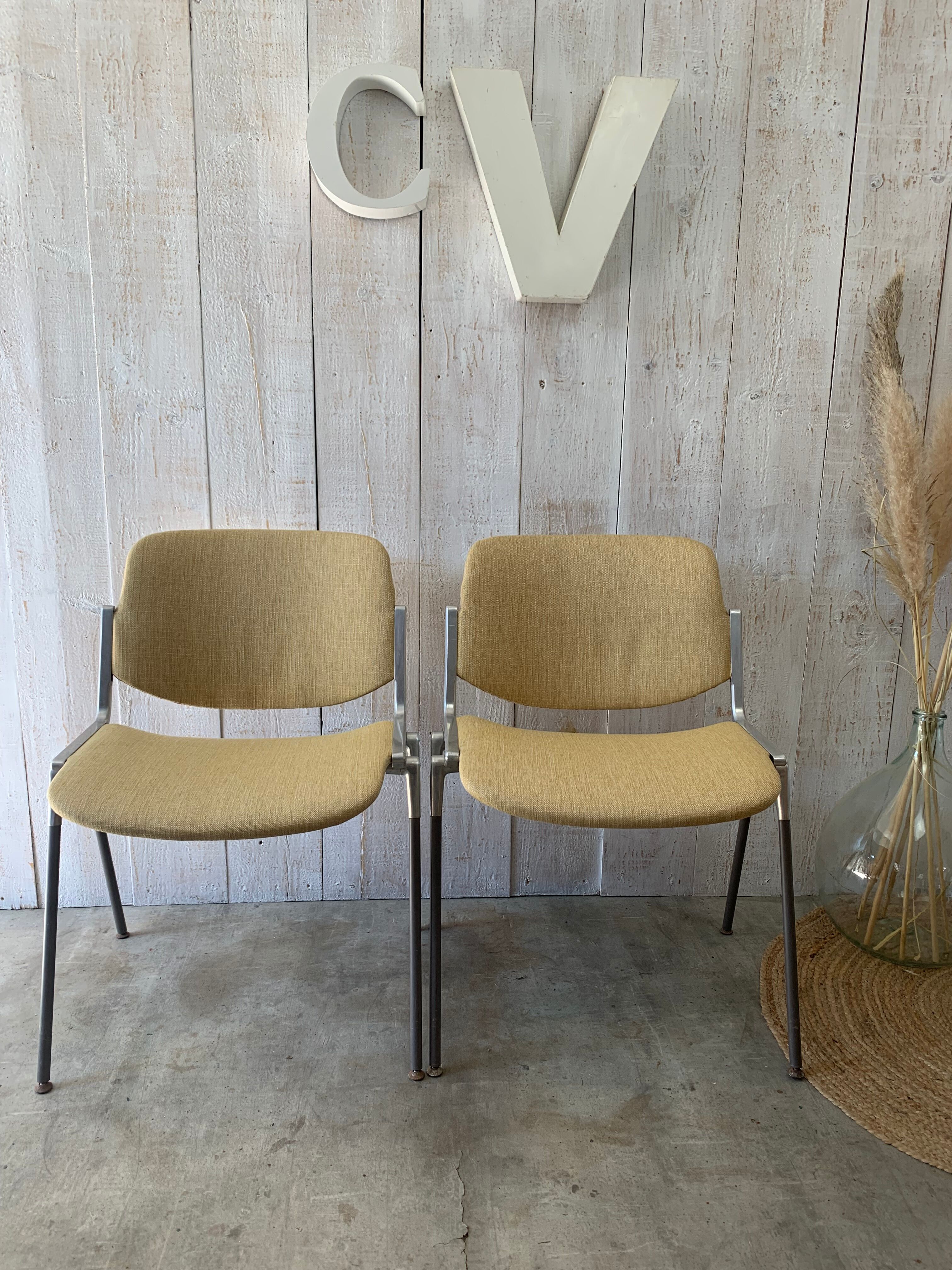 Pair of yellow Castelli chairs