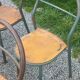 Set of 7 metal chairs by René Herbst with wooden seats.