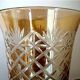 Amber-coloured iridescent crystal vase