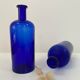 Cobalt blue glass pharmacy bottle