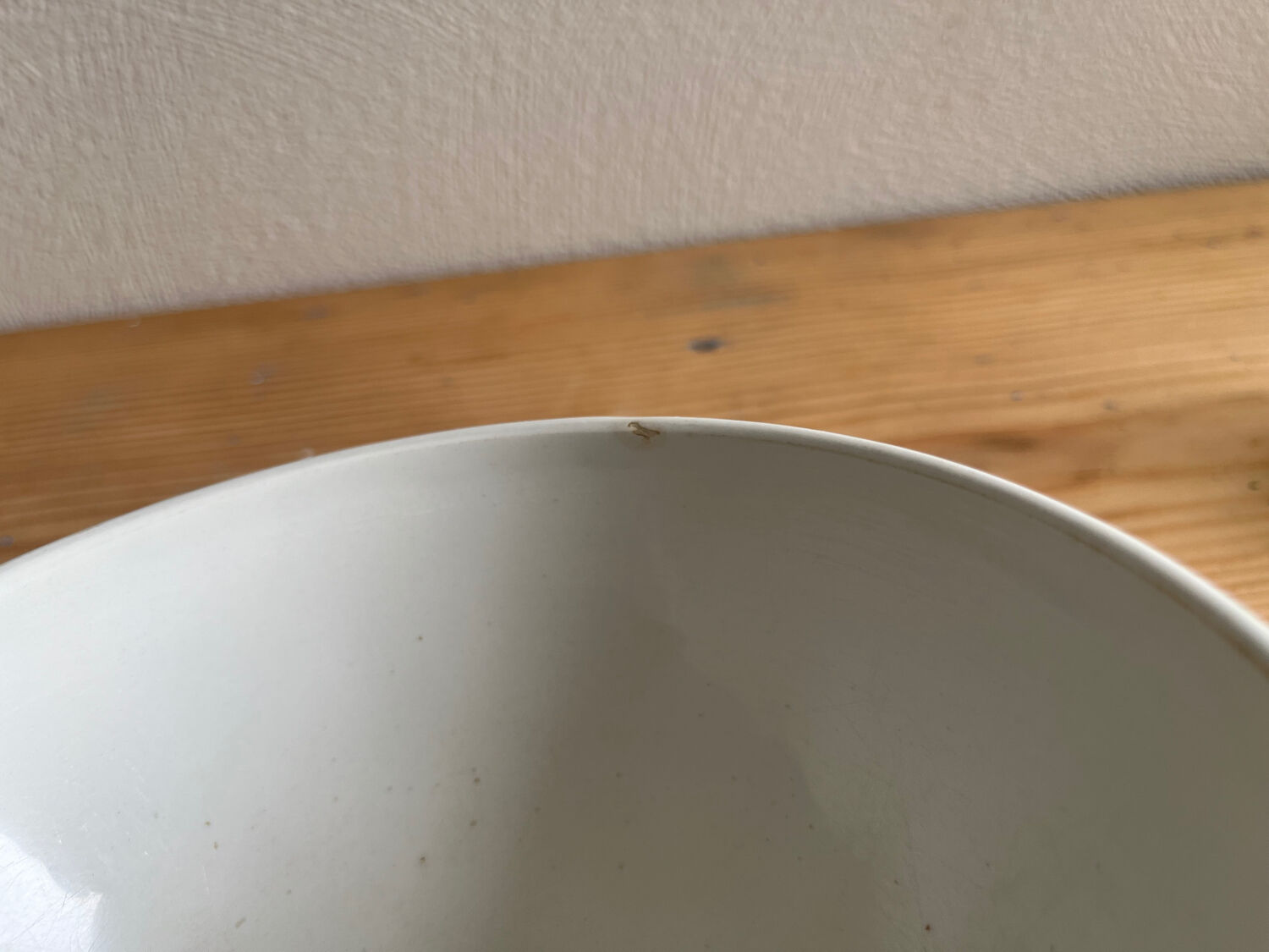 Antique faceted bowl on earthenware pedestal