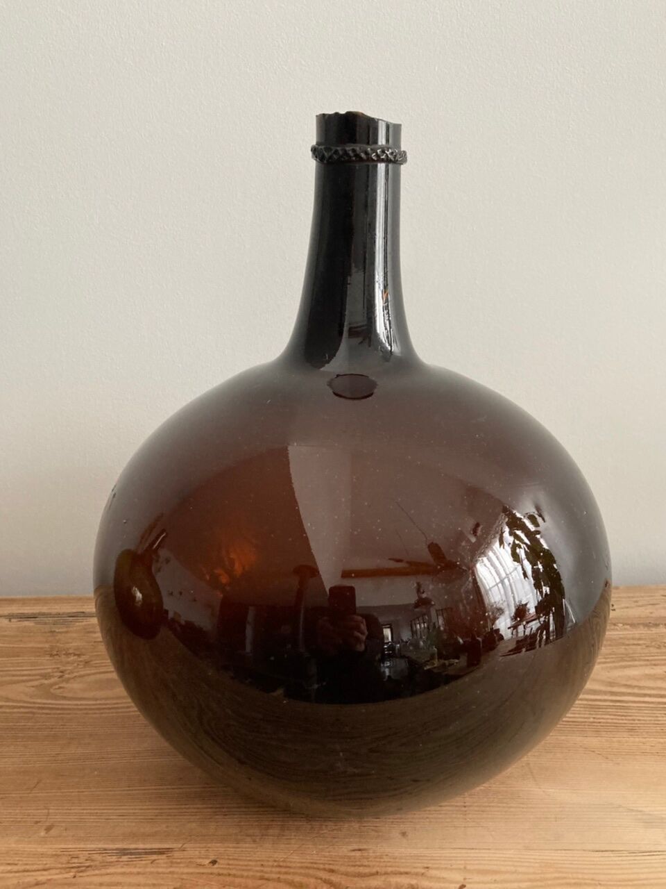 Old amber demijohn