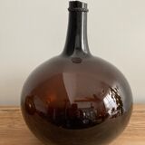 Old amber demijohn