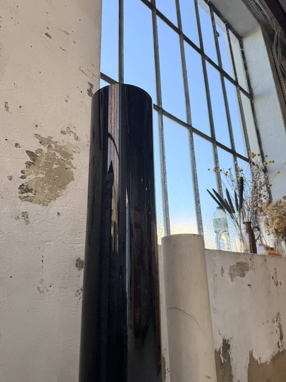 Set of 4 marble columns or pedestals.