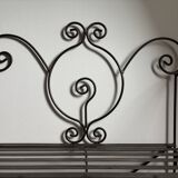 Wrought iron shelf in a revisited baker's style