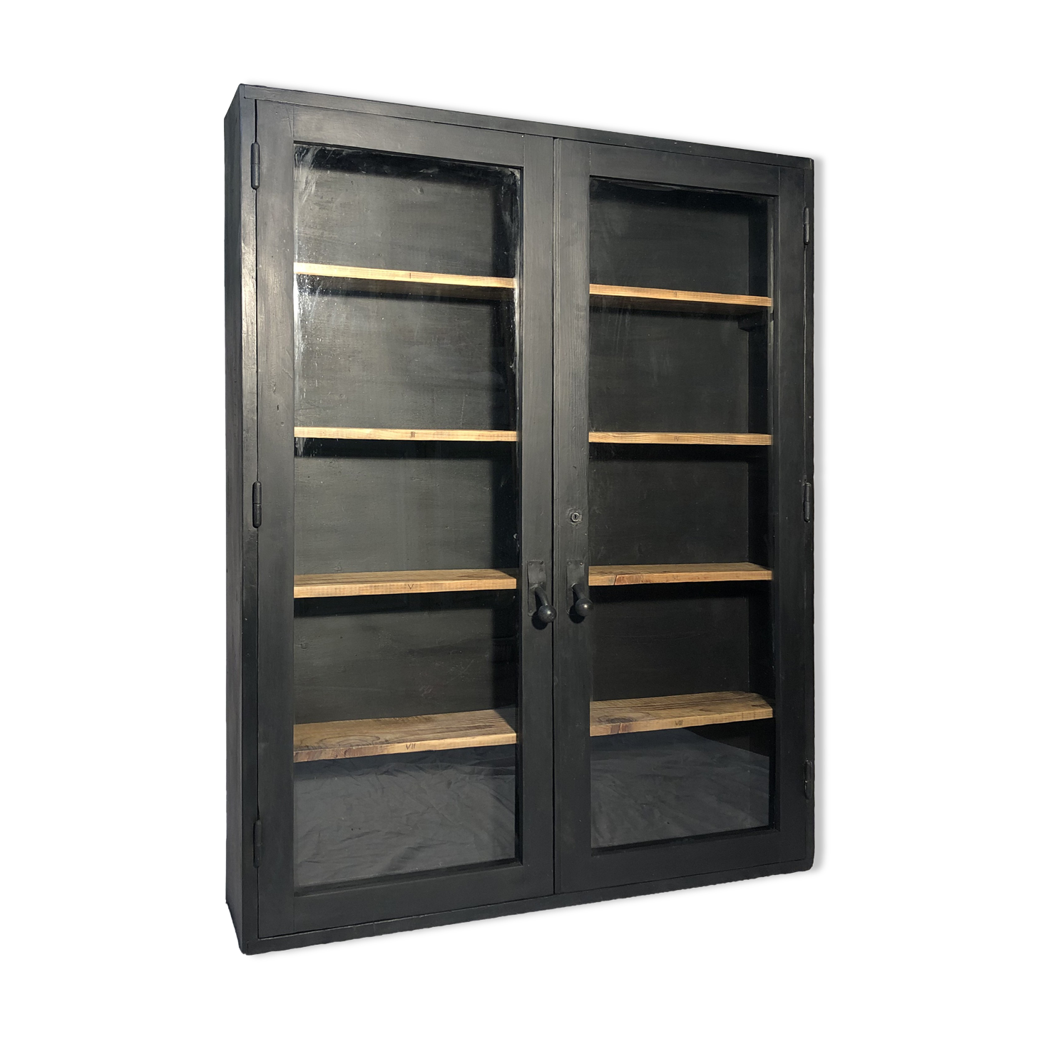 Former black painted wood workshop showcase