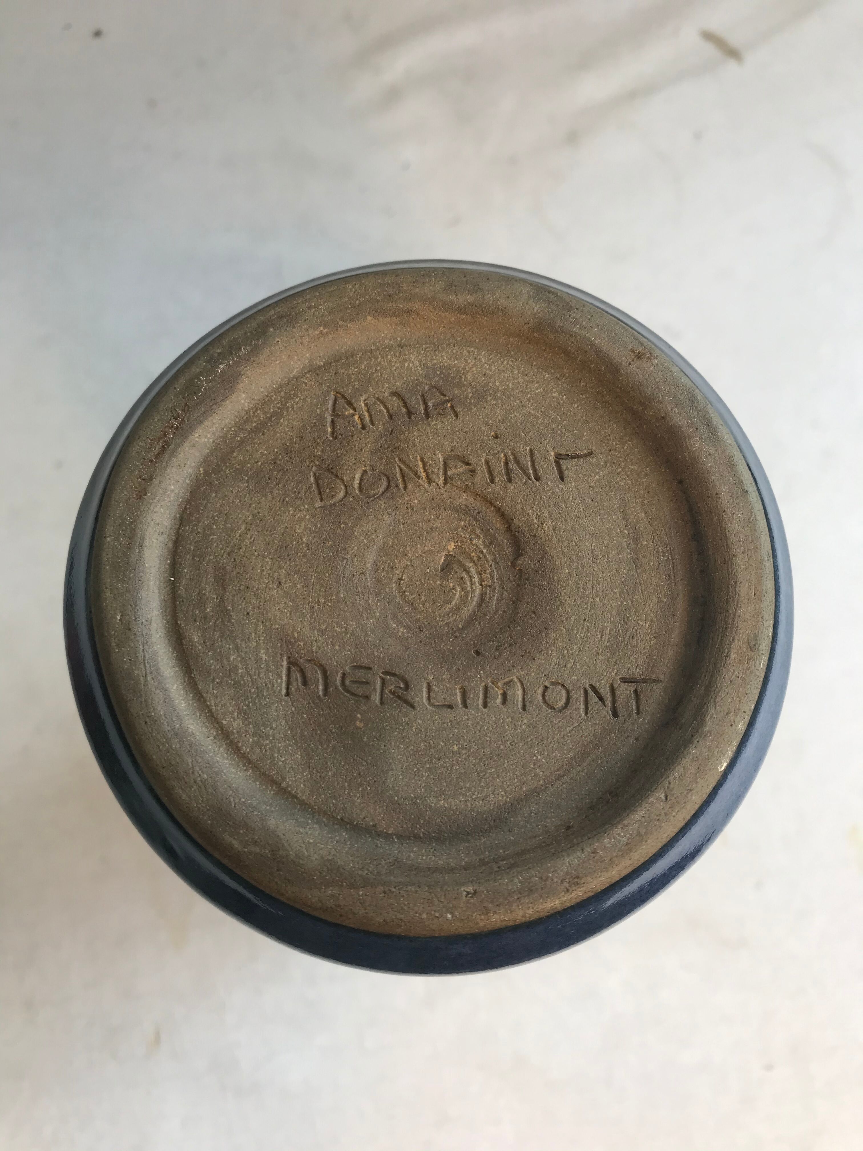 Old roll vase in blue sandstone