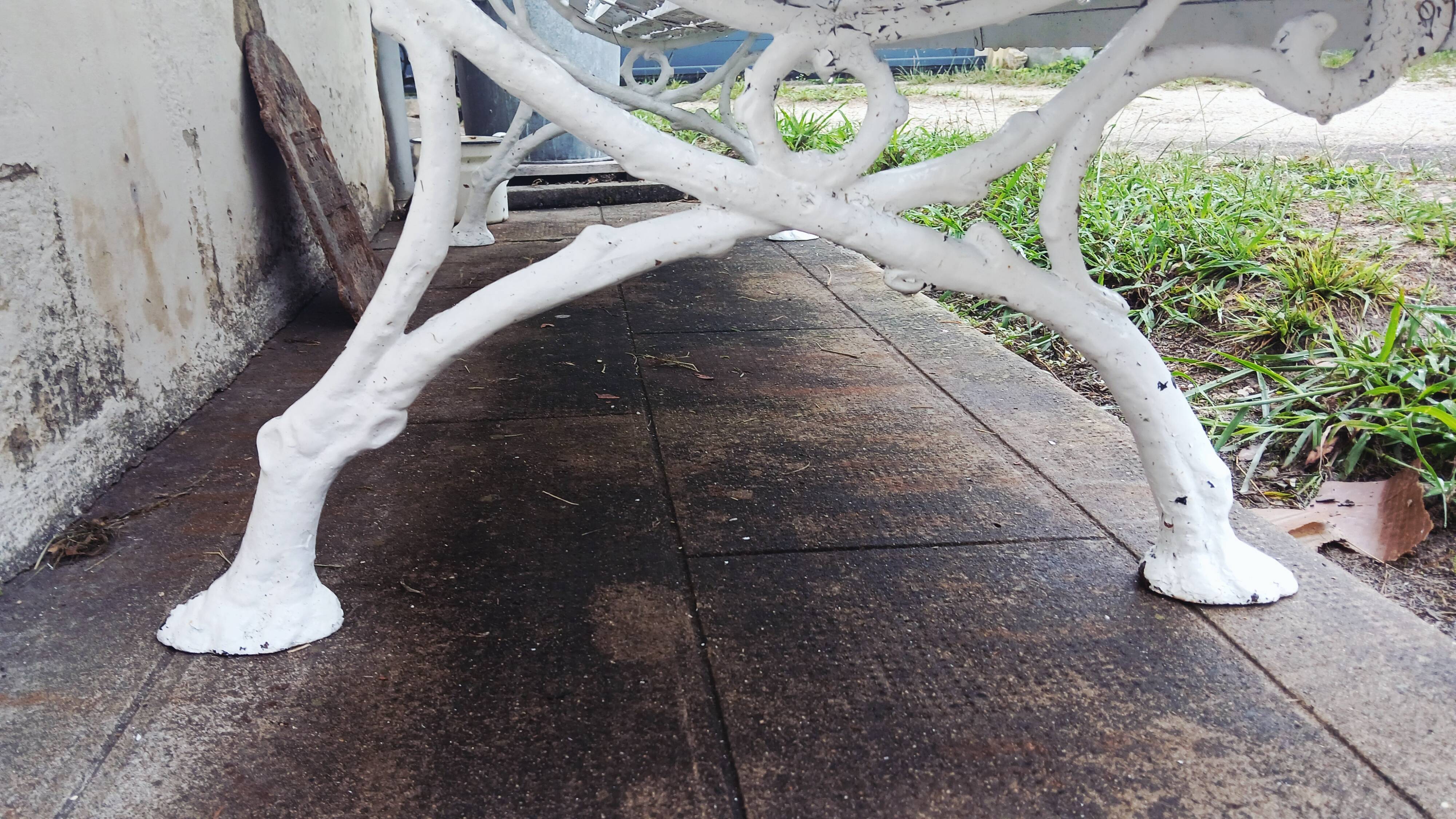 Cast iron and wooden slat garden bench from the early 20th century