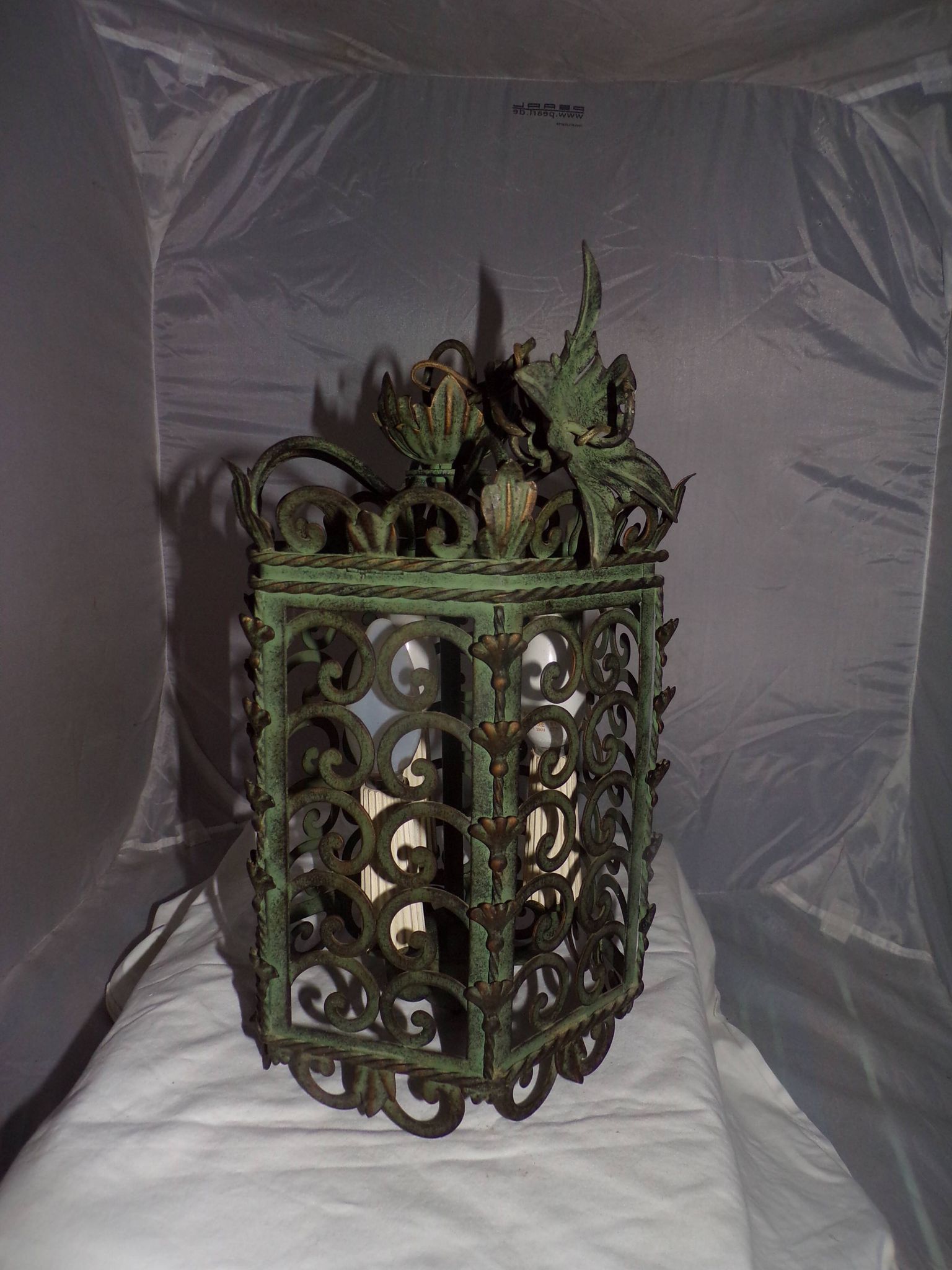 Lantern Cage 3 green lacquered metal lights work neatly from the 70s