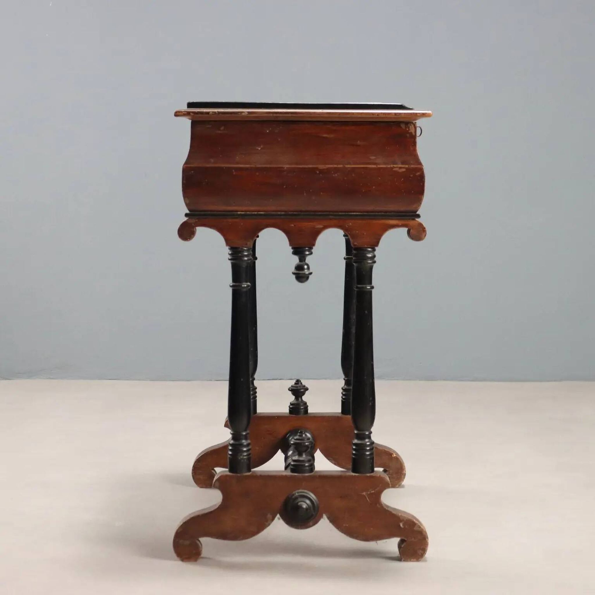 Antique sewing table in painted poplar with walnut effect, Italy, late 19th century.