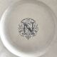 Round iron earth dish monogram “N” KG Lunéville