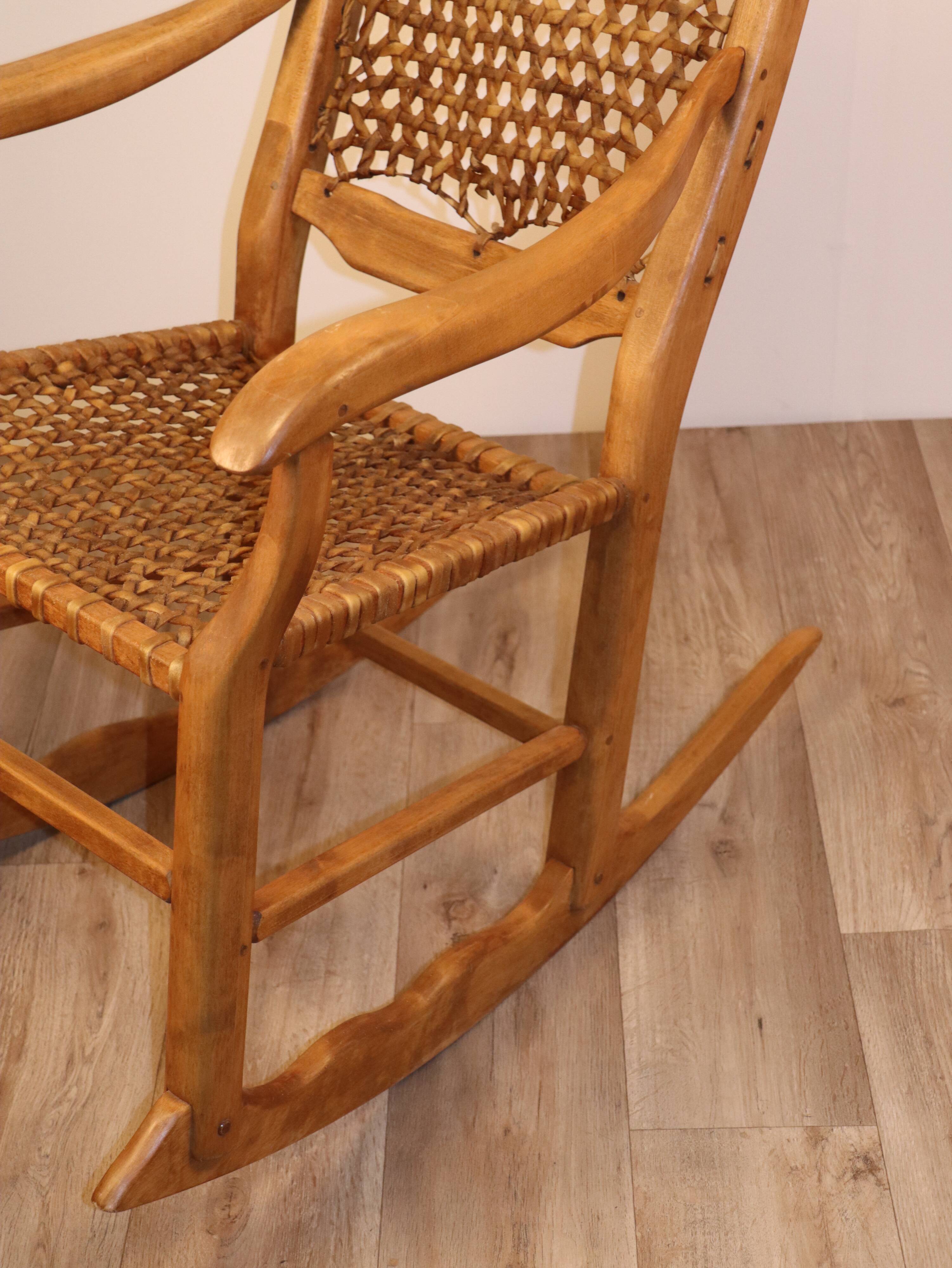Vintage rocking chair in solid wood 1950