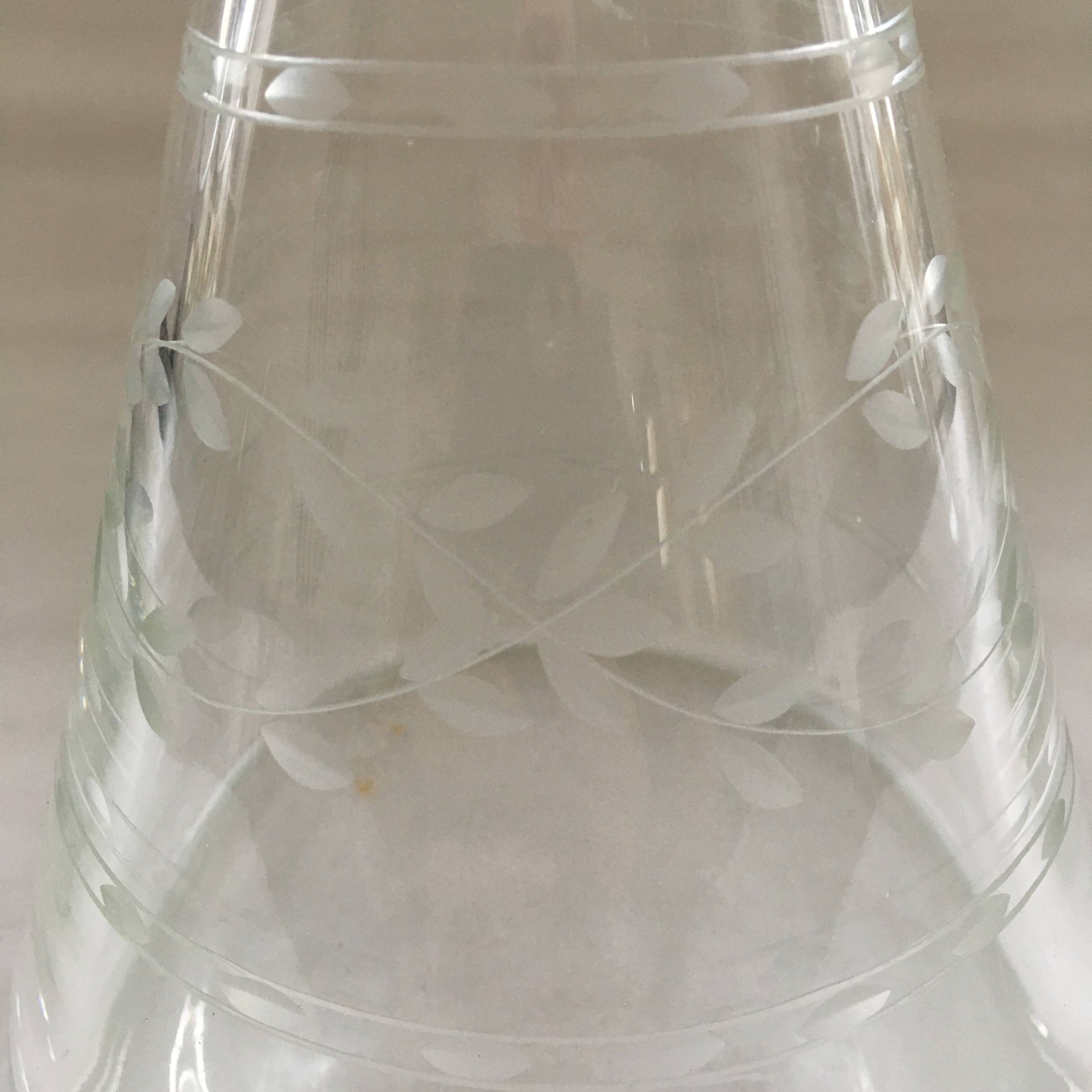 Carafe with chiseled floral decoration
