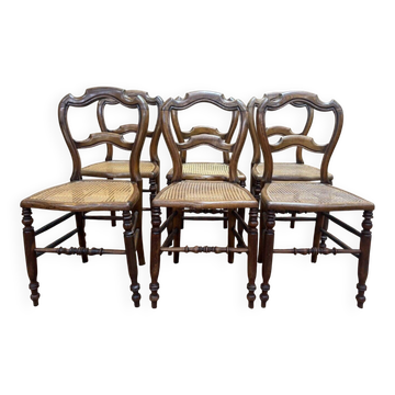 Set of 6 Louis-Philippe caned walnut chairs, 19th century.