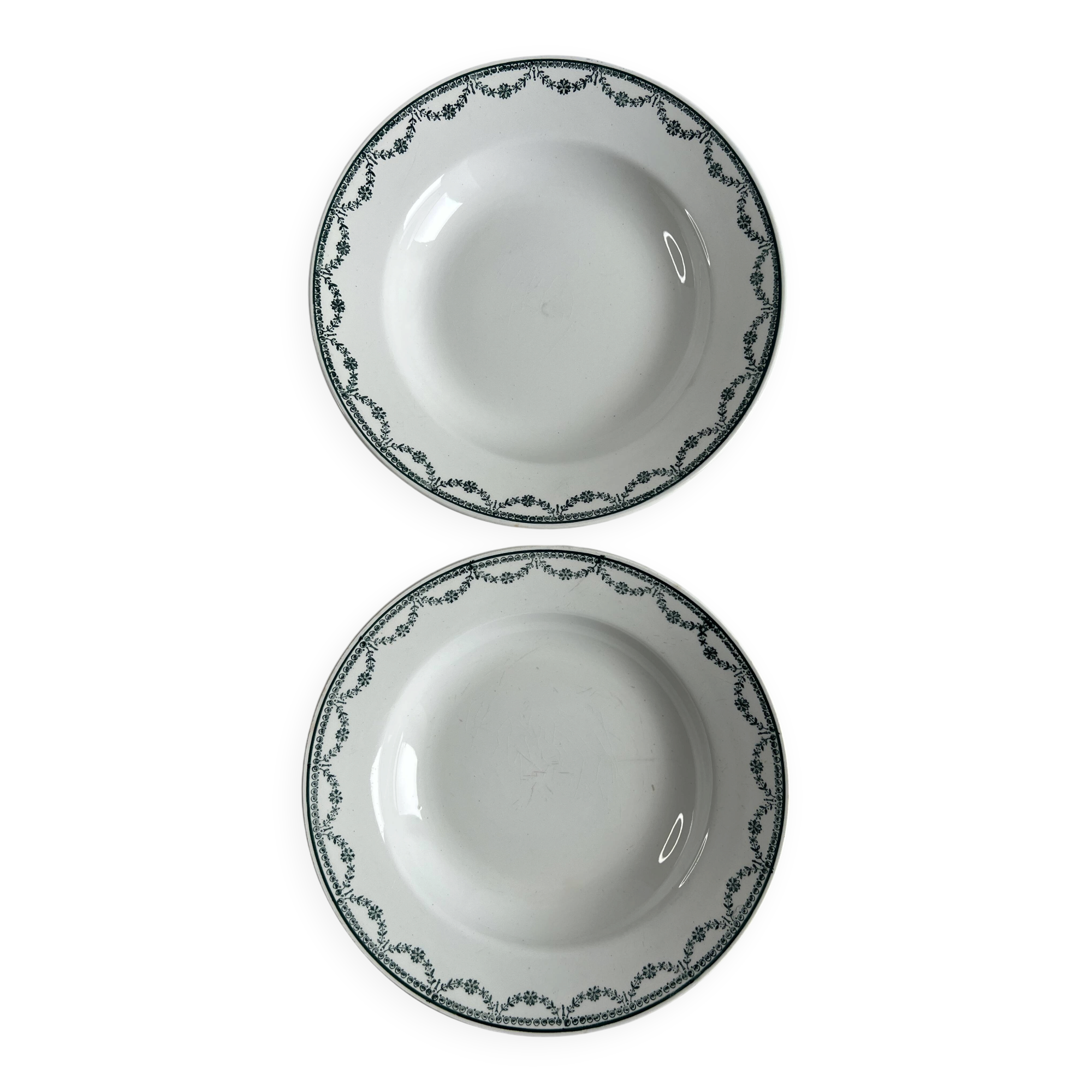 Set of two green frilled deep plates from Saint-Amand.