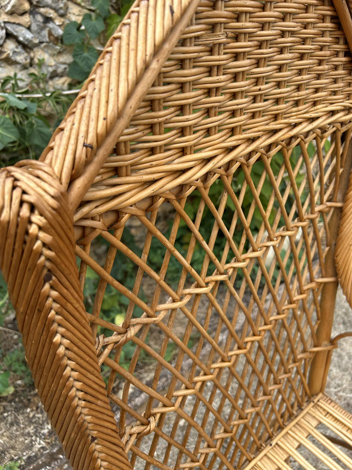 Antique rattan armchair