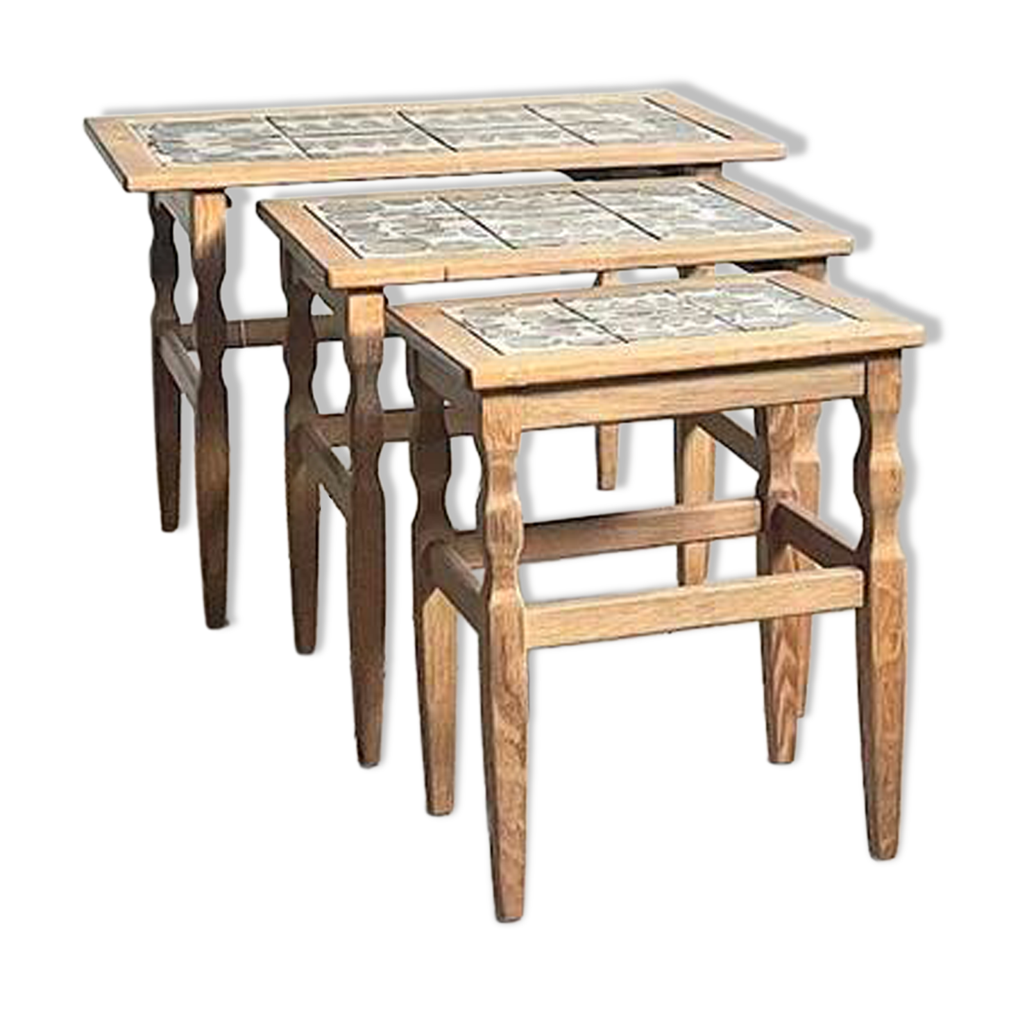 Henning Kjærnulf set of three oak nesting tables for EG Kvalitets, Denmark 1960s